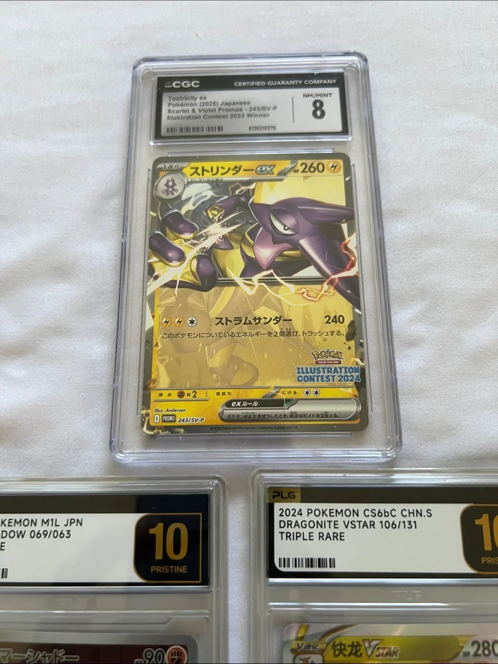 Pokemon Graded Trading Cards — Gold, Black and Purple Accents